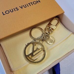 Louis Vuitton Gold Monogram Key Holder